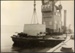Photograph: Floating crane lifting concrete caisson, 1913.; Auckland Harbour Board. Engineer's Dept.; 2010.132.231