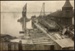 Photograph: Floating crane lifting vehicular landing bridge from old site at Queens Wharf to Northcote, 1913.; Auckland Harbour Board. Engineer's Dept.; 2010.132.232