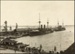 Photograph: Construction of Princes Wharf, with Japanese cruisers ASAMA and YAKUMA alongside, date unknown.; Auckland Harbour Board. Engineer's Dept.; 2010.132.56