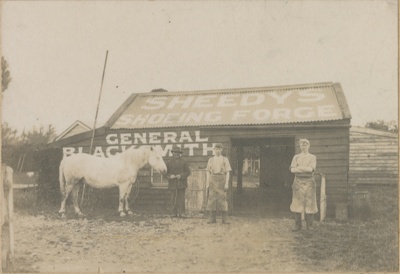 Photograph, Sheedy's Shoeing Forge; P Collins Photo; 1912-1915; OT.2010.73