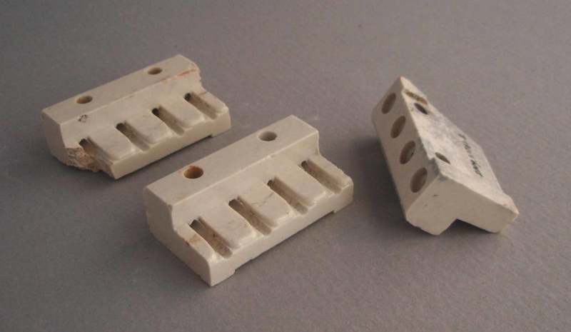 Three electrical fittings; Crown Lynn Technical Ceramics Limited; 1940-1975; 2009.1.1761.1-3