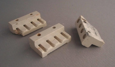 Three electrical fittings; Crown Lynn Technical Ceramics Limited; 1940-1975; 2009.1.1761.1-3
