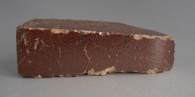 Brick fragment; Crown Lynn Potteries Limited; 1930-1950; 2009.1.1680
