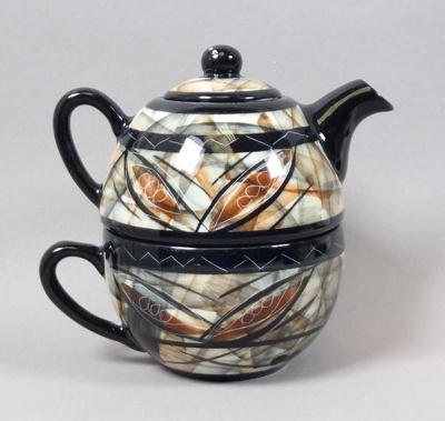 Cup and teapot set - Tapa pattern; Studio Ceramics NZ Ltd; 2002; 2017.1.6