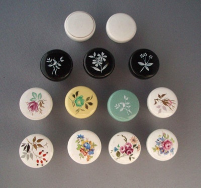 Handle or knob x 13; Crown Lynn Technical Ceramics Limited; 1967-1979; 2009.1.1828.1-13