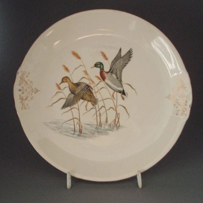 Cake plate - Wildlife pattern; Crown Lynn Potteries Limited; 1955-1965; 2008.1.935