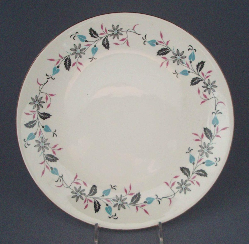 Bread and butter plate - floral; Crown Lynn Potteries Limited; 1958-1965; 2008.1.2053 Bread and butter plate - floral; Crown Lynn Potteries Limited; 1958-1965; 2008.1.2053