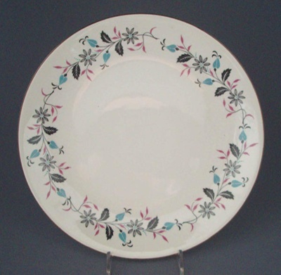 Bread and butter plate - floral; Crown Lynn Potteries Limited; 1958-1965; 2008.1.2053