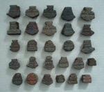 Backstamp fragments; Unknown; 1965-1989; 2009.1.606.1-27