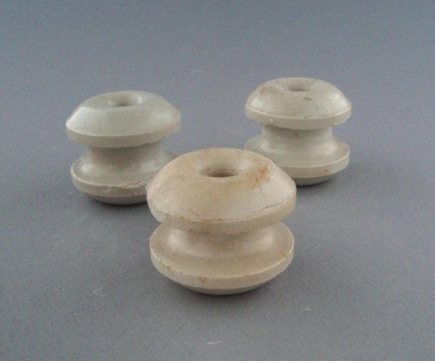 Bobbin insulators; Crown Lynn Technical Ceramics Limited; 1930-1965; 2009.1.1296.1-3