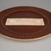 Bread and butter plate - glaze sample; Crown Lynn Potteries Limited; 1975; 2008.1.1774