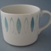 Coffee cup - Blue Tango pattern; Crown Lynn Potteries Limited; 1963-1968; 2008.1.1850