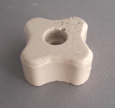 Electrical insulator fitting; Crown Lynn Technical Ceramics Limited; 1970-1989; 2009.1.1696