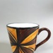 Mug - Tapa cloth; Studio Ceramics NZ Ltd; 2000s Decade; 2017.1.88