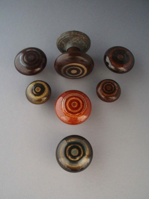 Handles x7; Crown Lynn Technical Ceramics Limited; 1976-1989; 2009.1.1822.1-7