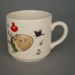 Child's cup - nursery rhyme; Crown Lynn Potteries Limited; 1975-1980; 2008.1.1309