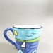 Mug - Auckland harbour; Studio Ceramics NZ Ltd; 2003; 2017.1.89