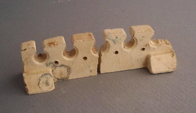 Electrical fitting; Crown Lynn Technical Ceramics Limited; 1940-1970; 2009.1.1758.1-2