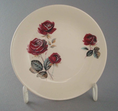 Butter pat - Rose Red pattern; Crown Lynn Potteries Limited; 1967-1975; 2008.1.948