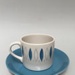 Blue Tango Coffee Can and Saucer; Crown Lynn Potteries Limited; 1963; 2024.2.9.1-2