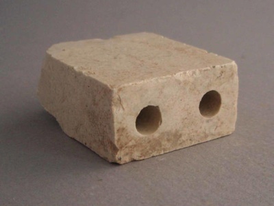 Electrical fitting fragment; Crown Lynn Technical Ceramics Limited; 1960-1989; 2009.1.1756