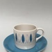 Blue Tango Coffee Can and Saucer; Crown Lynn Potteries Limited; 1963; 2024.2.9.1-2