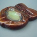 Ashtray - tiki shape; Crown Lynn Potteries Limited; 1945-1952; 2008.1.197
