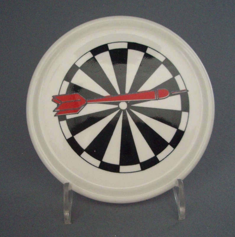 Coaster - darts; Crown Lynn Potteries Limited; 1988-1989; 2008.1.2628