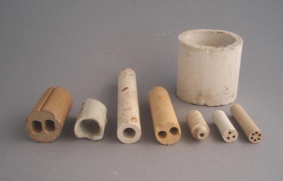 Electrical insulators; Crown Lynn Technical Ceramics Limited; 1940-1980; 2009.1.1965.1-8