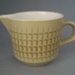 Cream jug - Novelle pattern; Crown Lynn Potteries Limited; 1968-1975; 2008.1.1063