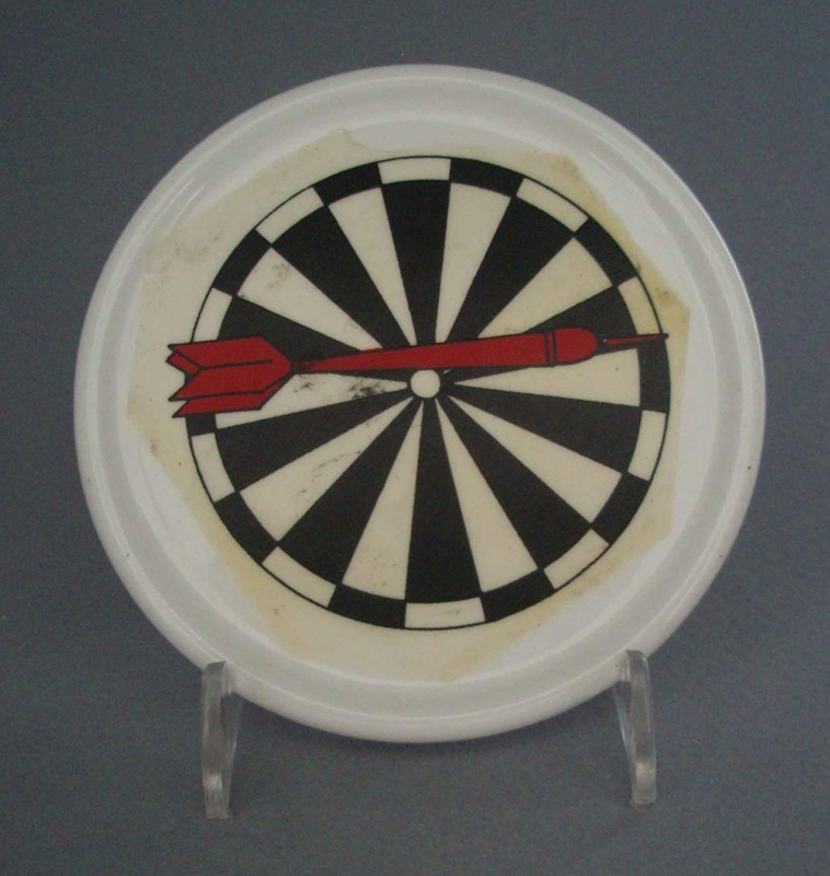 Coaster - darts; Crown Lynn Potteries Limited; 1988-1989; 2008.1.2631