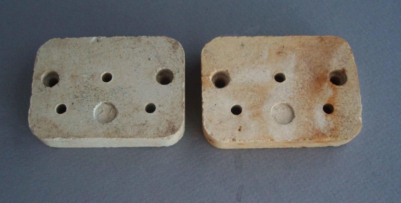 Pair of electrical insulators; Crown Lynn Technical Ceramics Limited; 1940-1980; 2010.1.23.1-2