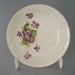 Butter pat - Lilac Time pattern; Crown Lynn Potteries Limited; 1960-1970; 2008.1.947