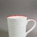 Mug - hei-tiki face; Studio Ceramics NZ Ltd; 2007; 2017.1.120