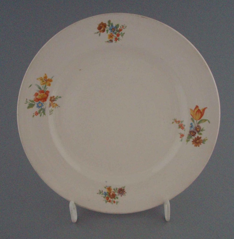 Bread and butter plate - floral; Crown Lynn Potteries Limited; 1948-1955; 2008.1.1999 Bread and butter plate - floral; Crown Lynn Potteries Limited; 1948-1955; 2008.1.1999