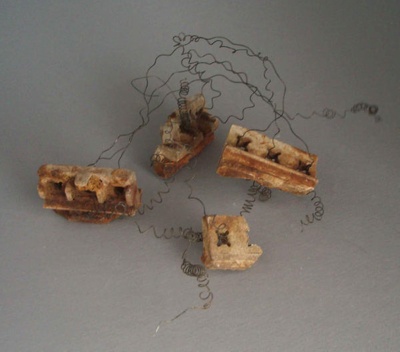 Ceramic fittings with remaining wire; Unknown; 1935-1950; 2009.1.2017