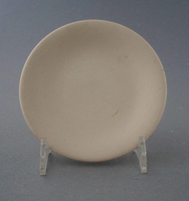 Butter pat - bisque; Crown Lynn Potteries Limited; 1964-1980; 2009.1.1268
