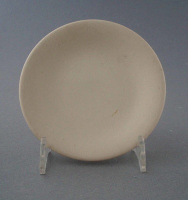 Butter pat - bisque; Crown Lynn Potteries Limited; 1964-1980; 2009.1.1268