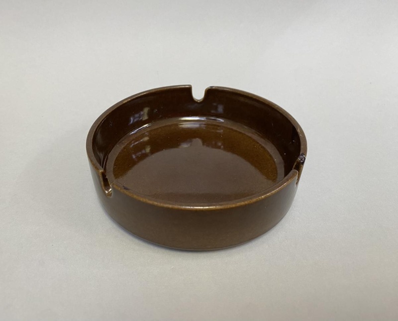 Dark Brown Ashtray; Crown Lynn Potteries Limited; 1970s-1980s; 2016.48.42 Dark Brown Ashtray; Crown Lynn Potteries Limited; 1970s-1980s; 2016.48.42