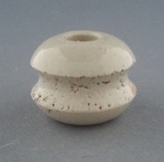 Bobbin insulator; Crown Lynn Technical Ceramics Limited; 1930-1965; 2009.1.1299