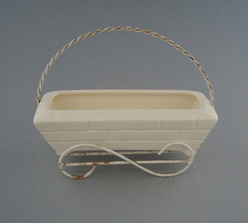 Trough with wire frame; Crown Lynn Potteries Limited; 1960-1975; 2008.1.1117.1-2