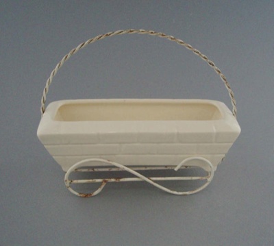 Trough with wire frame; Crown Lynn Potteries Limited; 1960-1975; 2008.1.1117.1-2