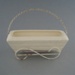 Trough with wire frame; Crown Lynn Potteries Limited; 1960-1975; 2008.1.1117.1-2