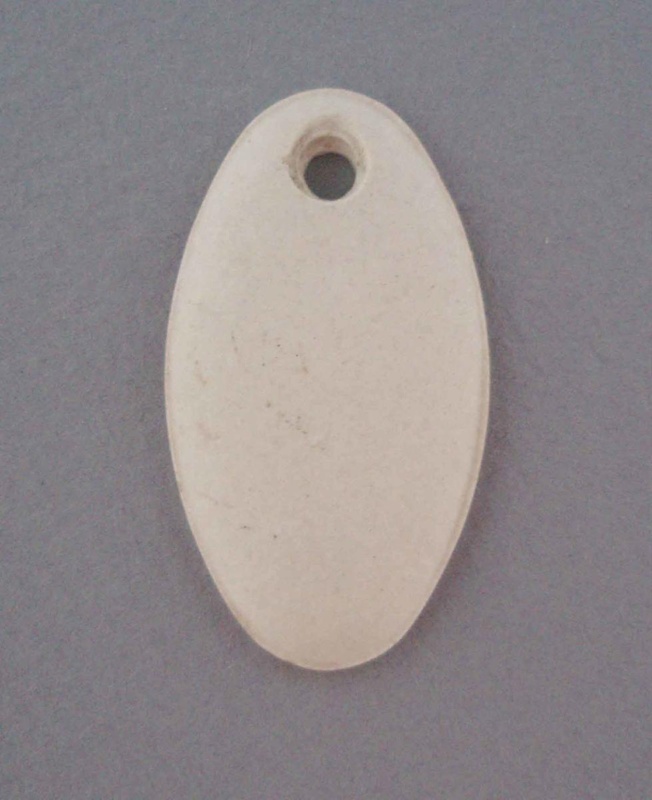 Key hole cover - bisque; Crown Lynn Technical Ceramics Limited; 1965-1985; 2008.1.671