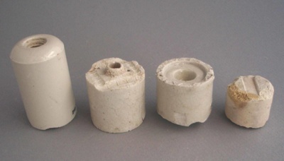 Ceramic insulators; Crown Lynn Technical Ceramics Limited; 1940-1980; 2009.1.1969.1-4