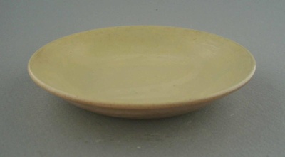 Butter pat - South Pacific pattern; Crown Lynn Potteries Limited; 1965-1975; 2009.1.987