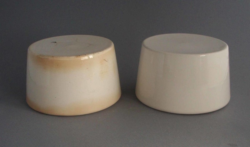 Two electrical insulators; Crown Lynn Technical Ceramics Limited; 1950-1989; 2009.1.1666.1-2