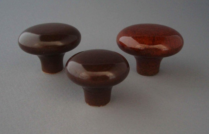 Handle x 3; Crown Lynn Technical Ceramics Limited; 1976-1989; 2009.1.1823.1-3