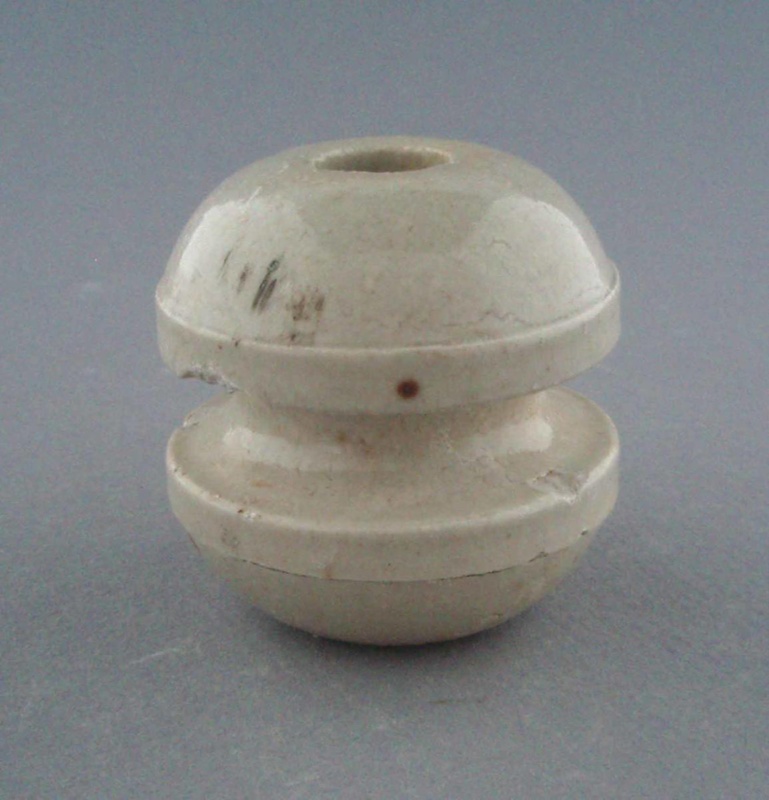 Bobbin insulator; Crown Lynn Technical Ceramics Limited; 1930-1965; 2009.1.1300