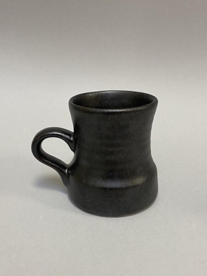 Mug - Black Titian; Crown Lynn Potteries Limited; 1970s; 2024.1.1